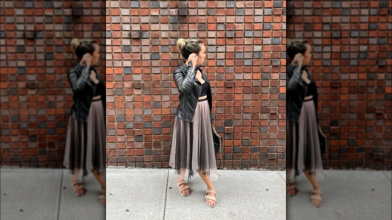 Woman in tulle midi skirt