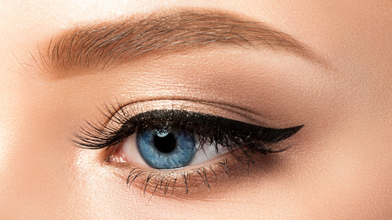 blue eyes with black eyeliner