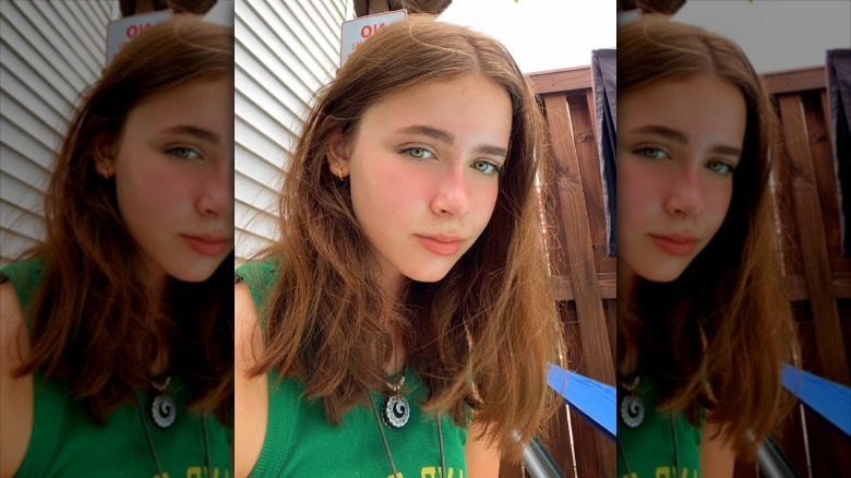 Light brown hair green eyes