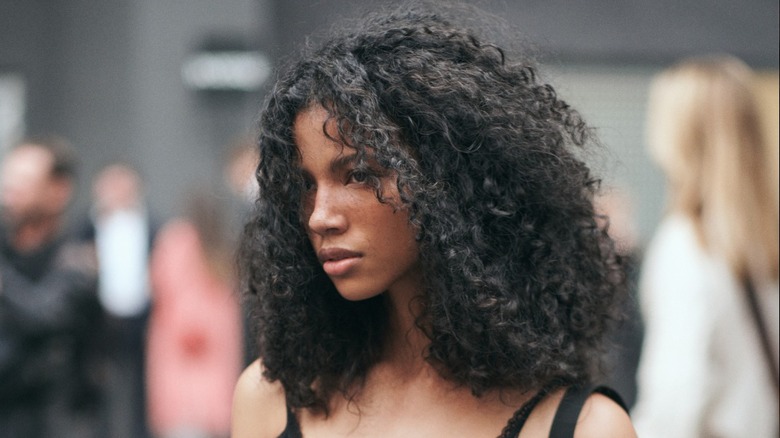 Woman with long natural curls