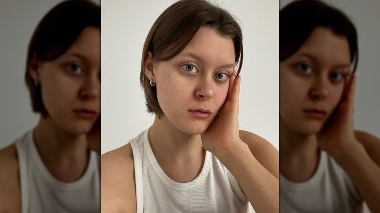 Brunette with long pixie cut
