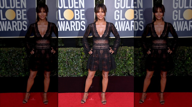 Halle Berry poses for photos on the Golden Globes red carpet