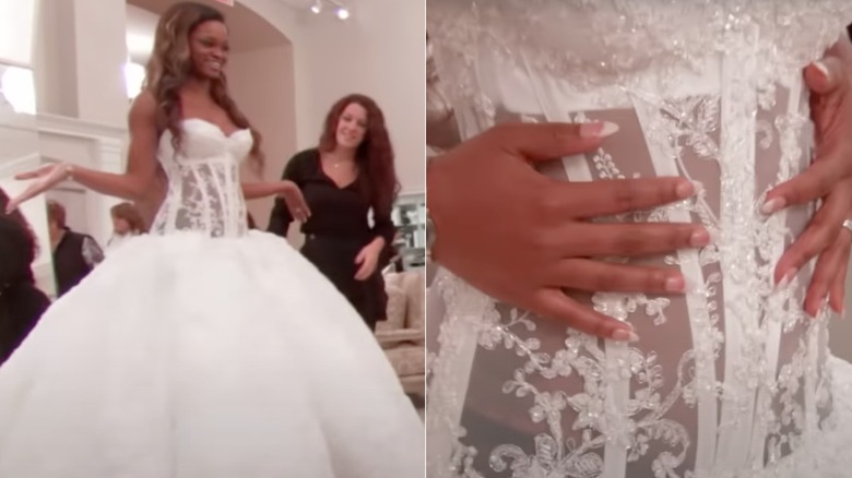 A bride tries on a drop-waist corset gown