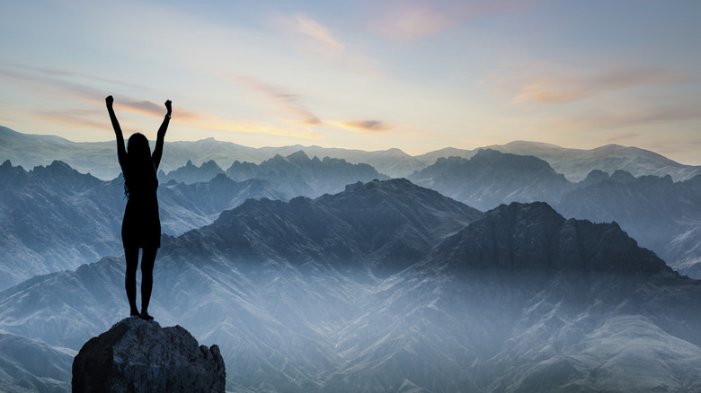 indepdent woman on mountain