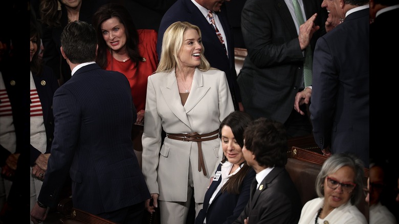 Pam Bondi wearing a pantsuit that made her look like a Judo fighter at the 2026 State of the Union