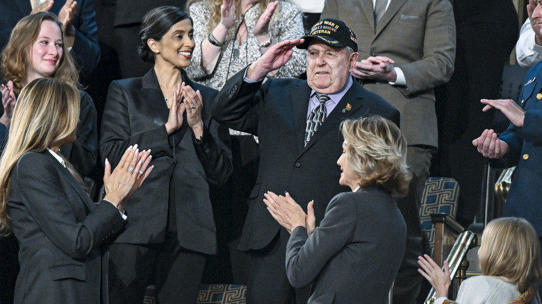 Usha Vance in a black outfit clapping at the 2026 State of the Union