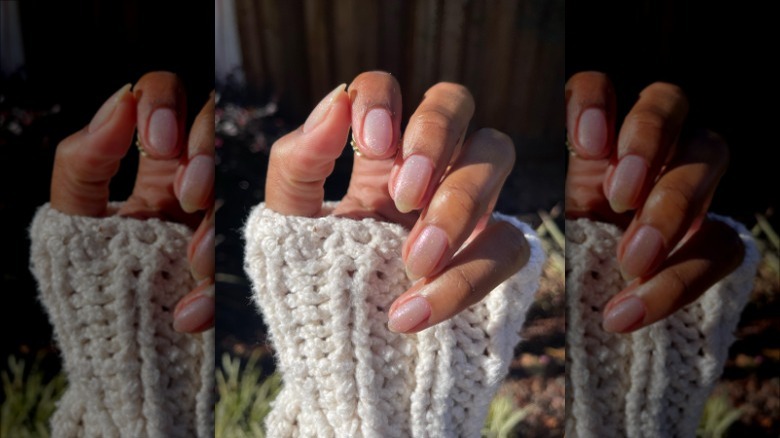 woman's hand with glitter manicure