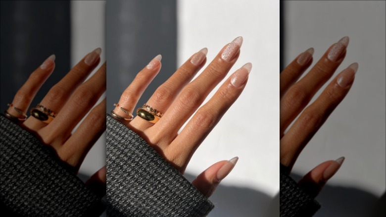 woman with clear base and glitter top coat