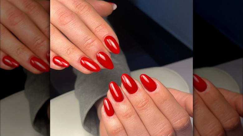 Red almond nails to hands