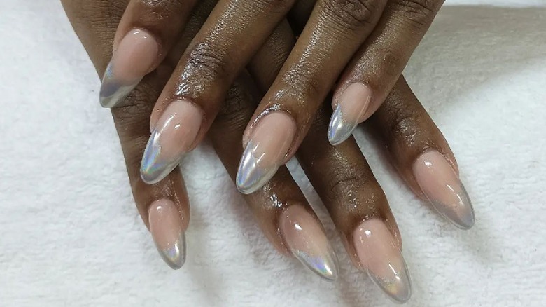 Almond nails with metallic silver tips black hands
