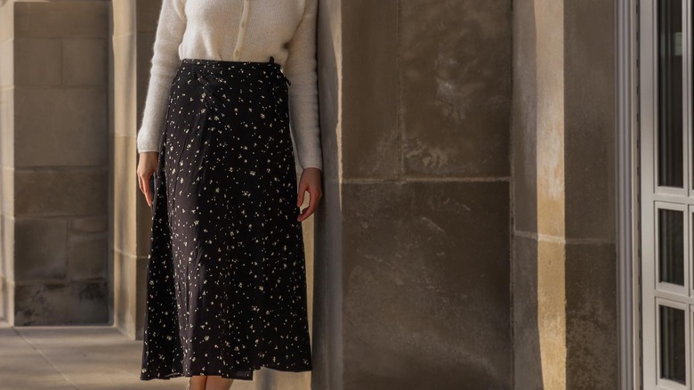 White top and black maxi skirt