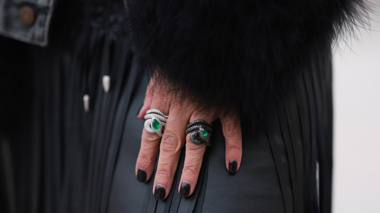Woman's hands with birthstone