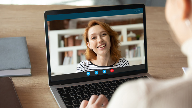 woman talking through screen