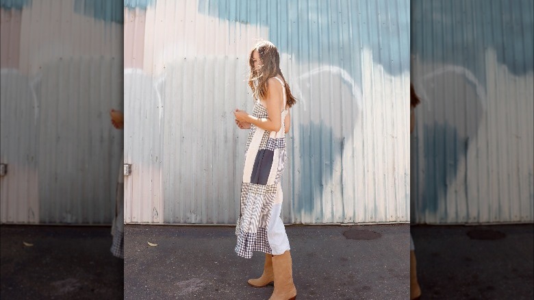 Girl in patchwork dress.