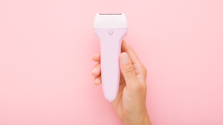 epilator pink background