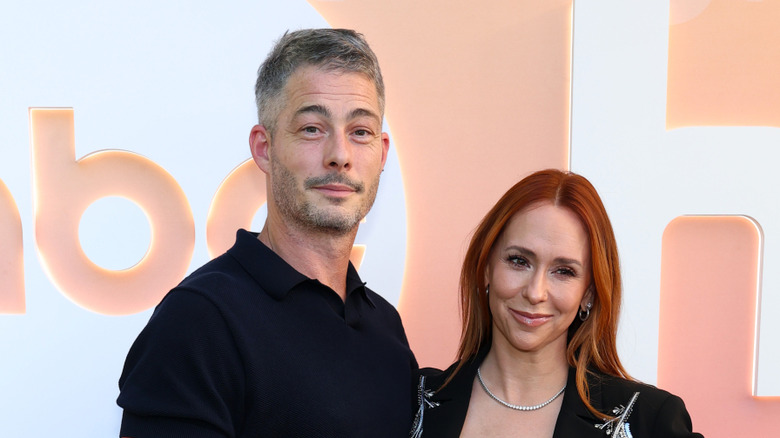 Brian Hallisay and Jennifer Love Hewitt smiling