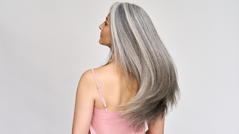 Woman with long gray hair