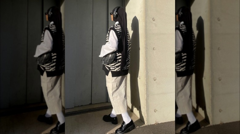 Woman wearing ivory cargo midi skirt