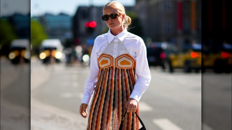 woman wears sheer dress