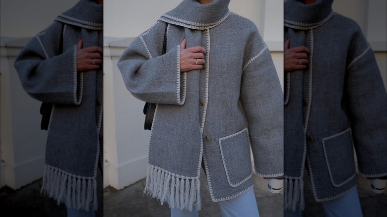 Woman wearing scarf coat