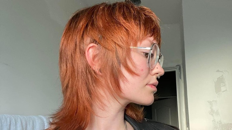 Profile of a woman with a shullet