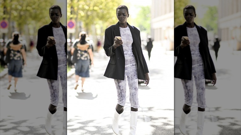 woman with sheer white dress and blazer