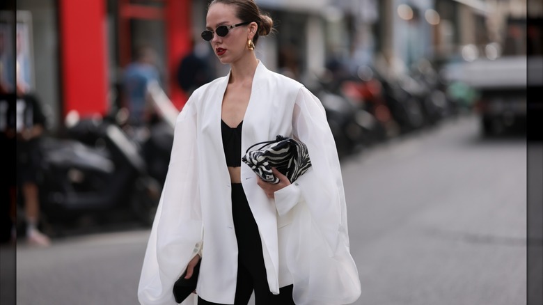 woman wearing white outerwear