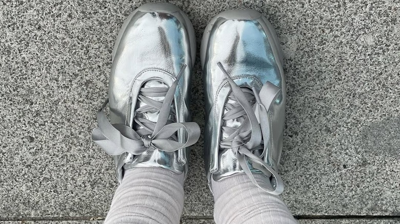 A pair of metallic sneakerinas paired with white socks