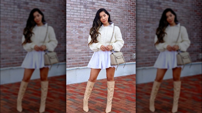 Cream sweater and purple dress