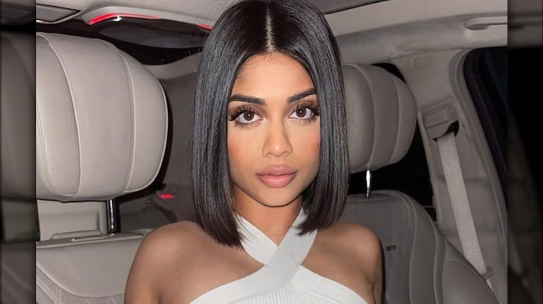 person with a curtain cut