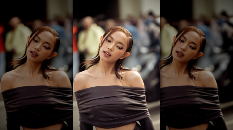 woman with slicked side parted hair 