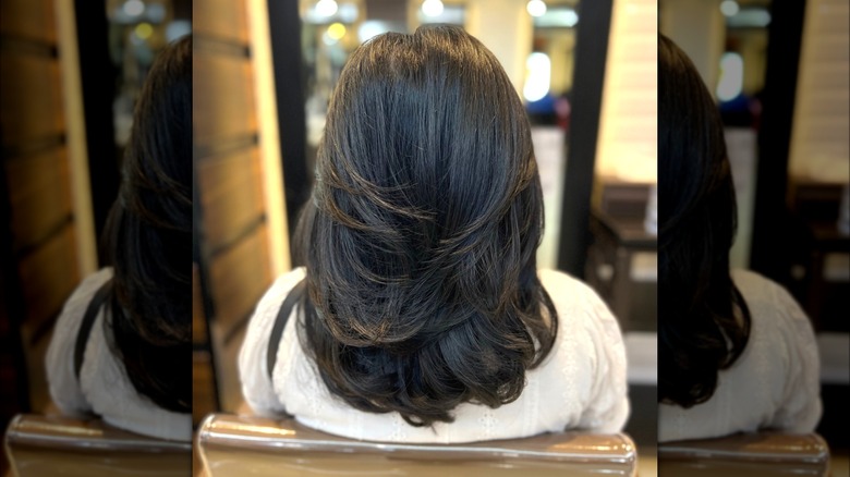 Medium-length step haircut from behind