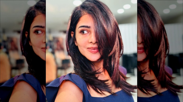 woman with medium step haircut