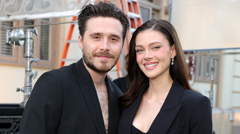 Brooklyn Peltz Beckham and Nicola Peltz Beckham posing for a photo at Vogue World: Hollywood 2025 at Paramount Studios