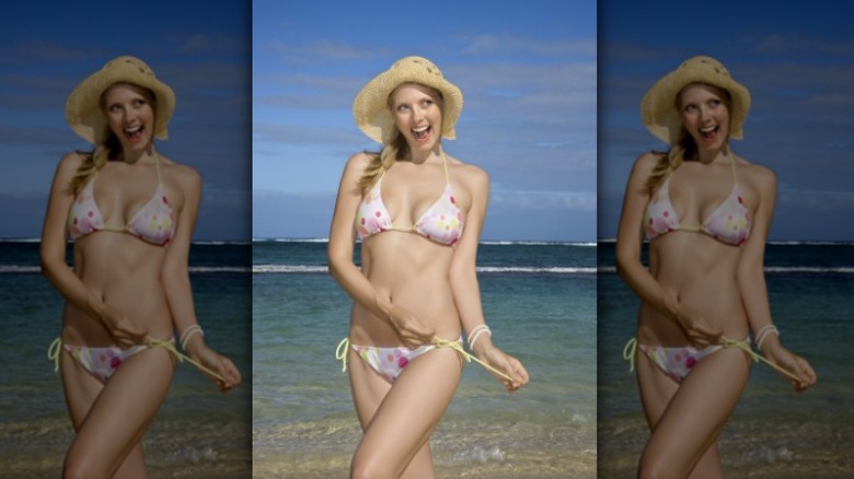 Woman wearing string bikini, hat