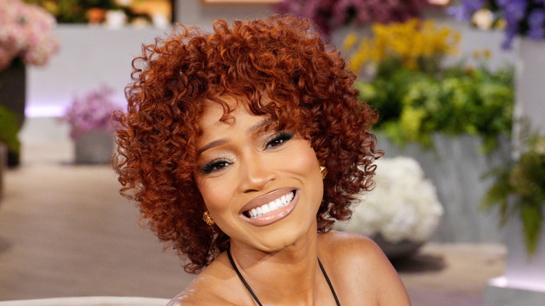 Keke Palmer smiled on the set of The Jennifer Hudson Show