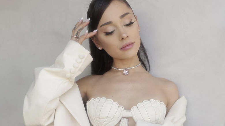 Ariana Grande in cream dress