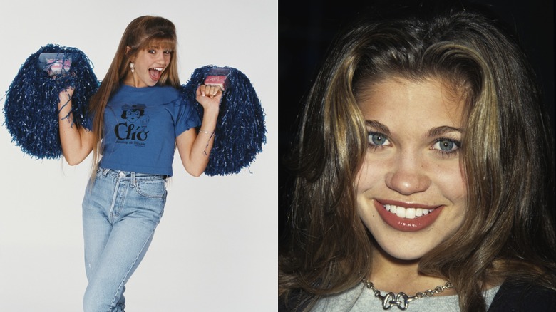 Danielle Fishel in the '90s holding pom poms.