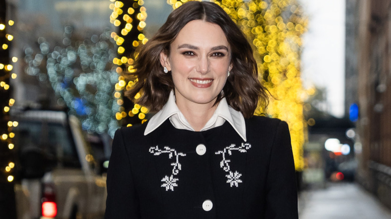 Keira Knightley smiling for the camera.