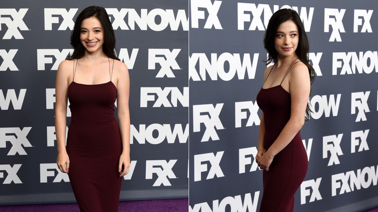 Mikey Madison walks the red carpet in a plum-purple dress in 2016