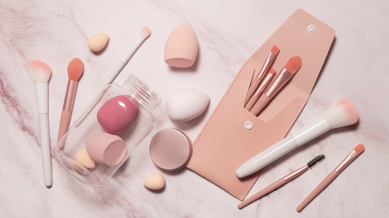 pink makeup tools and brushes