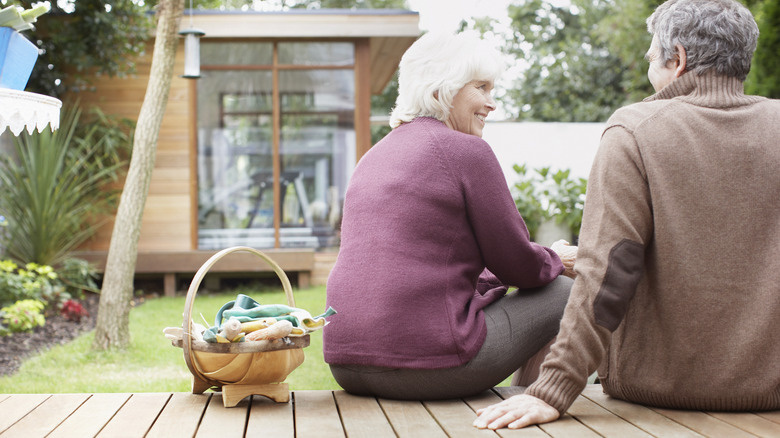 Couple sitting outside