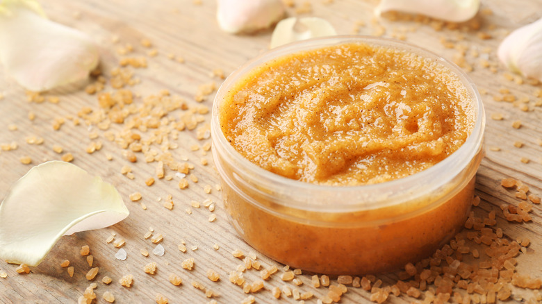 scrub in a plastic container