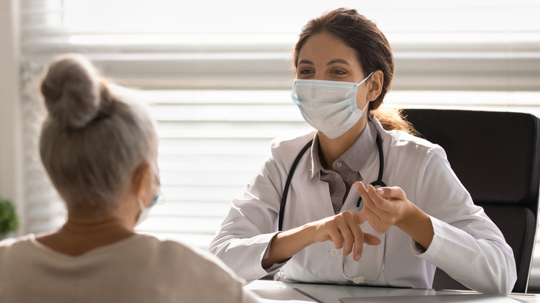 A doctor advises a patient