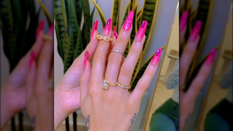 hand with stacked rings