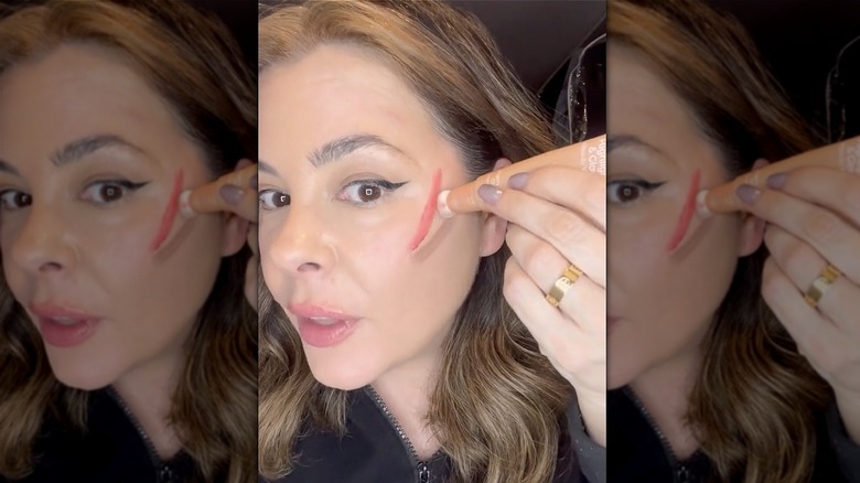 Makeup artist showing triangle contour hack