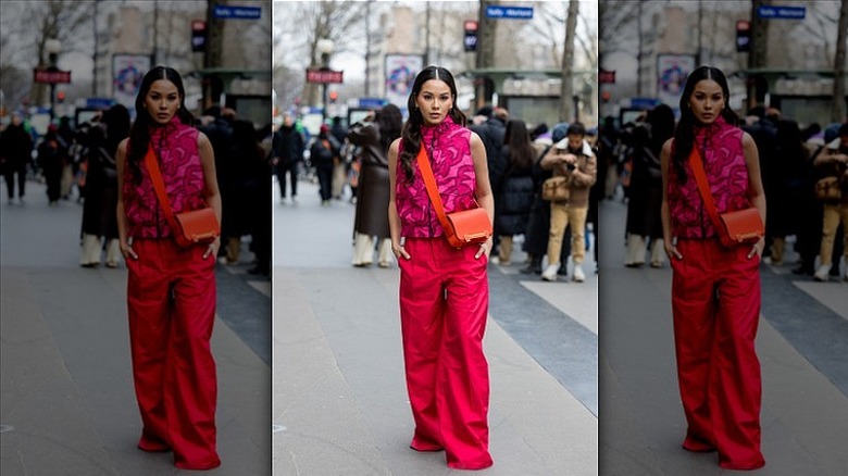 woman wearing red pants 