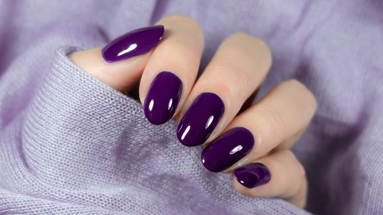 Purple nails and jumper