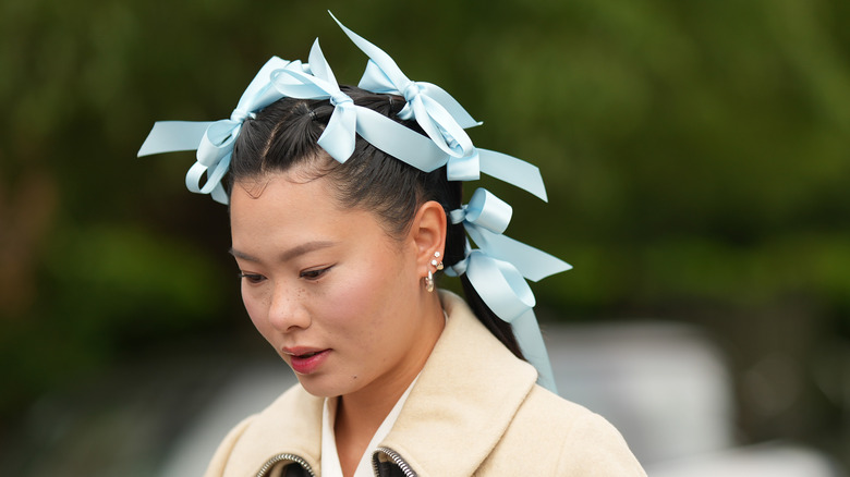 woman with ribbons in hair