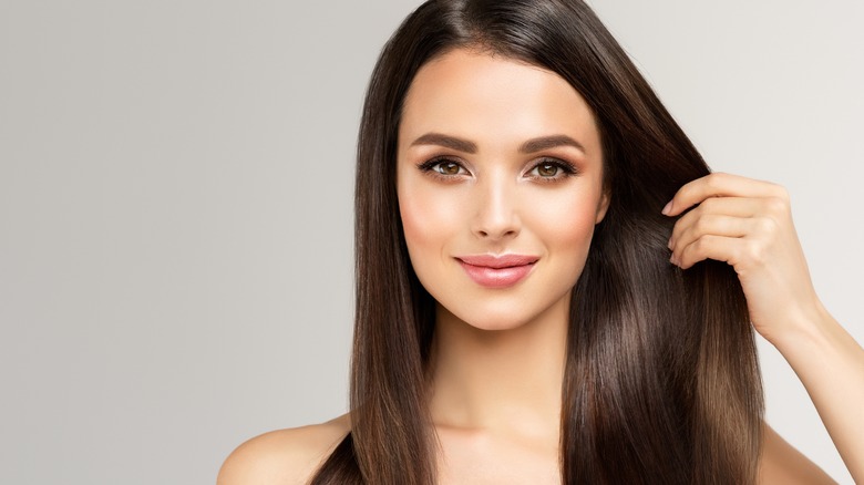 Woman with shiny brown hair